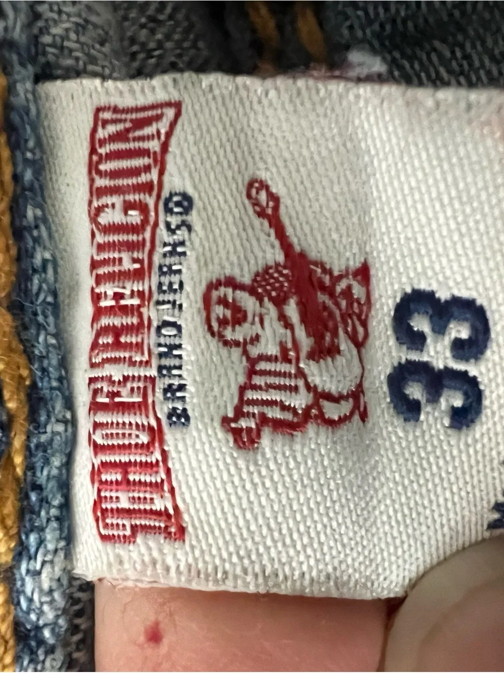 True Religion Denim with Red and Navy Logo